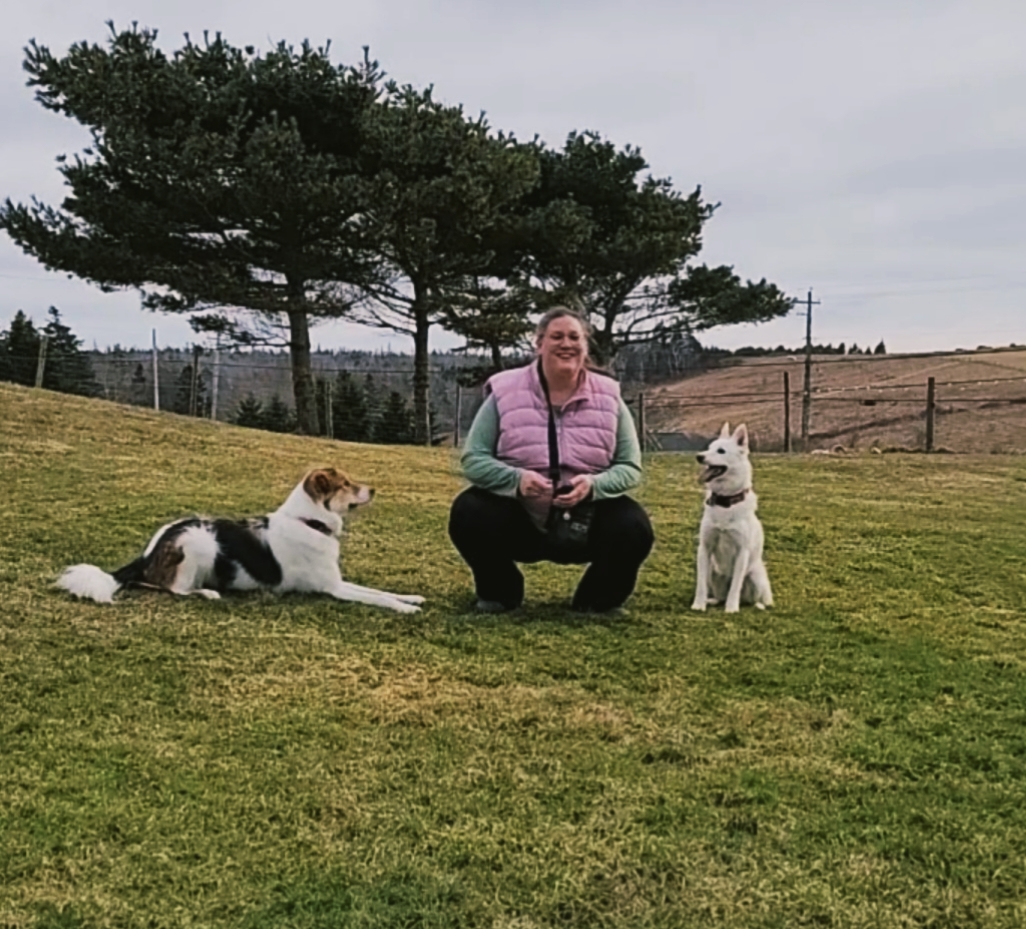 Dog trainer, Lori-Lee Regimbald in Darlings Lake Nova Scotia, near Yarmouth, with her two rescue dogs Casey and Kitchi.